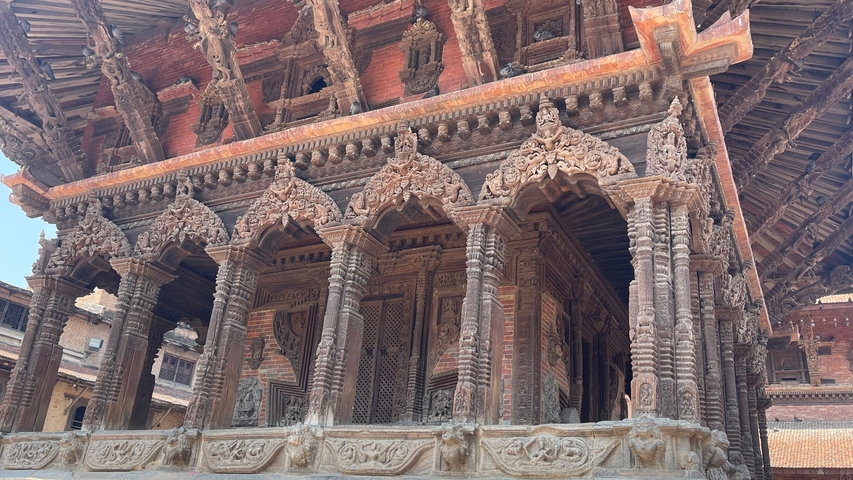Wooden temple with detailed carvings.