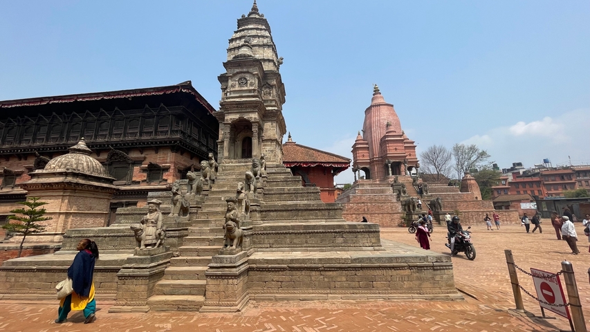       Wide stone steps leading to temples.
  