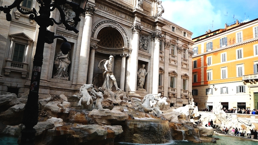       Trevi Fountain with sculptured figures.
  