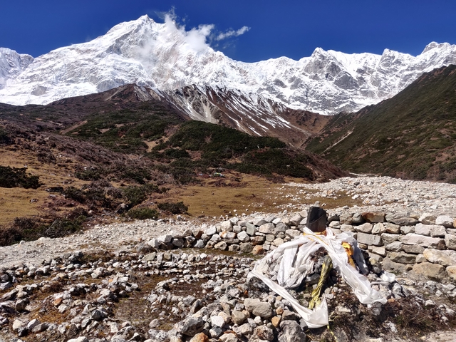 Stone structure with panoramic view of snow mountains