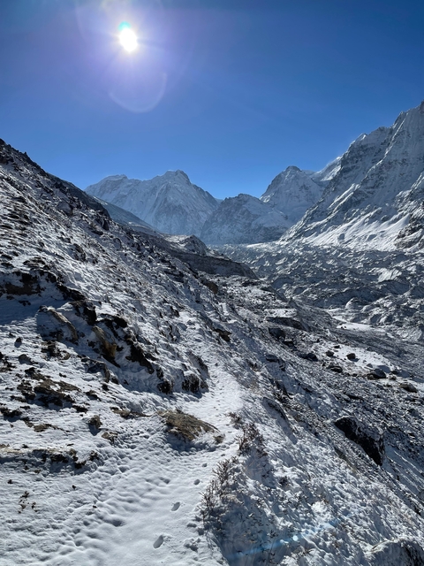       Rocky snow-covered pathway in mountains
  