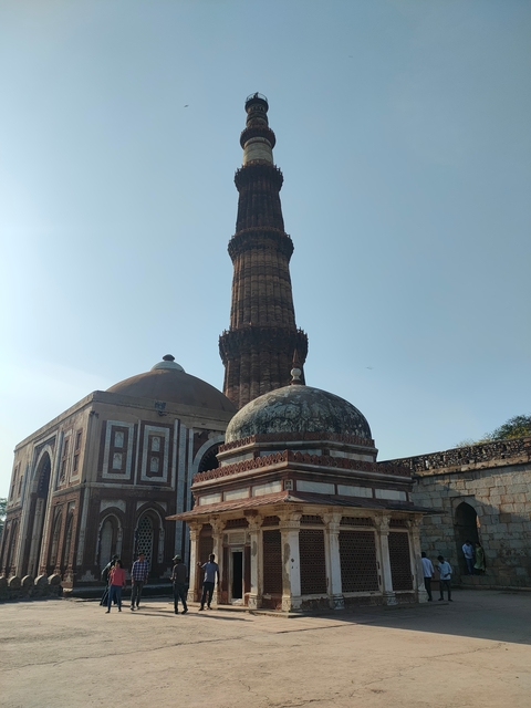 Tall historical tower with intricate designs.