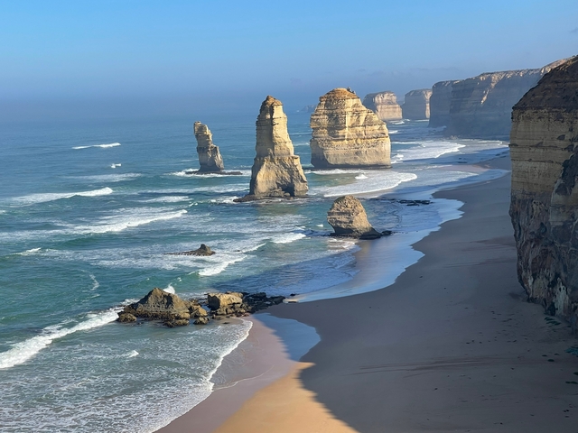 Coastal rock formation along a scenic shoreline.