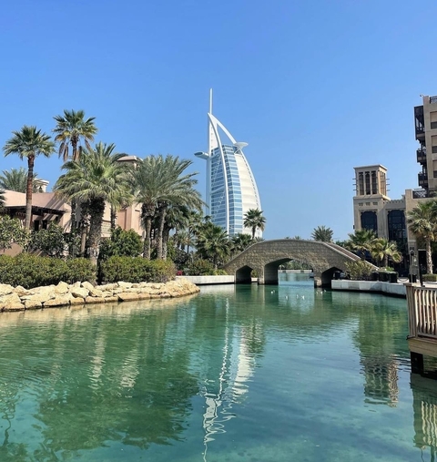 Luxurious urban hotel with famous architecture near water.