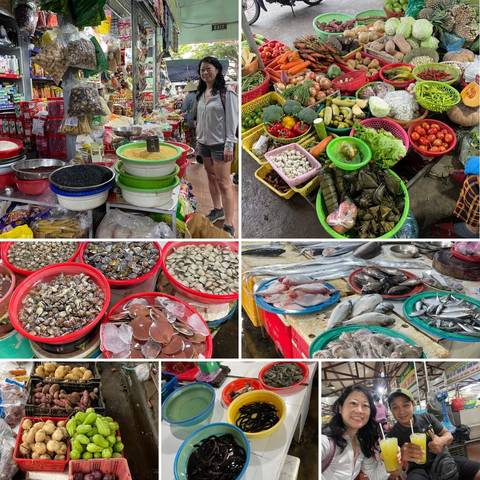 Various fresh seafood and vegetables at a market.