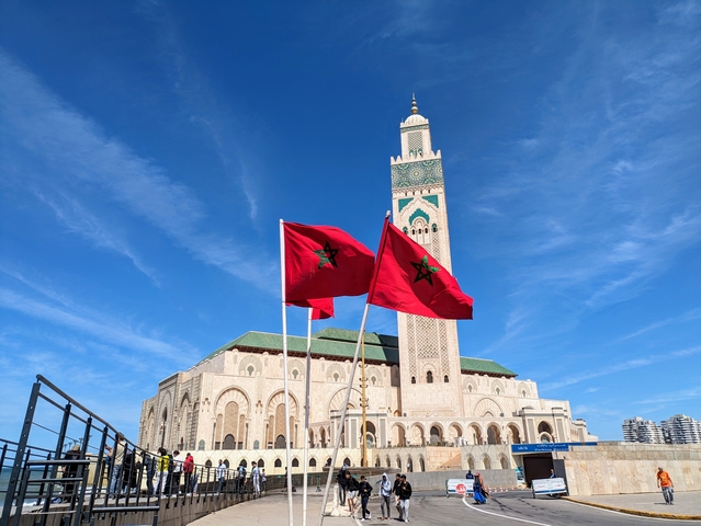 Hassan II Mosque with Moroccan flags in Casablanca.