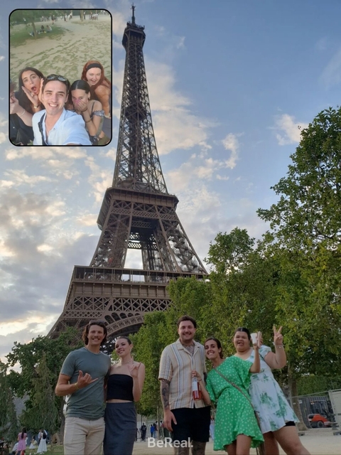 Person near the Eiffel Tower; cropped image with unclear perspective.