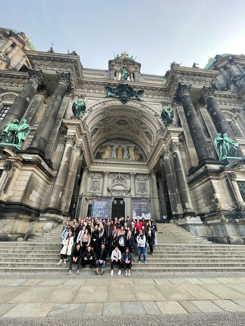 Group of people in front of Berlin Cathedral.