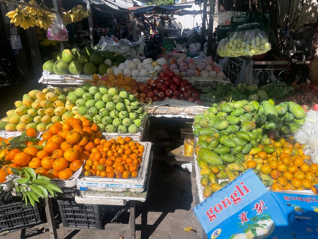 Vibrant display of various fruits at a market.
