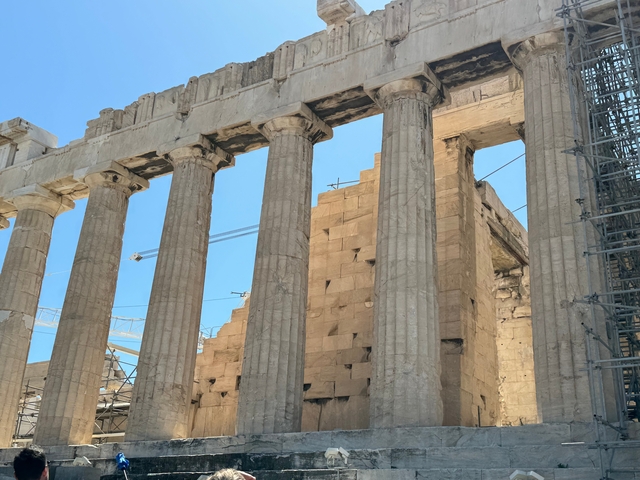       Ancient Greek columns with stairs.
  