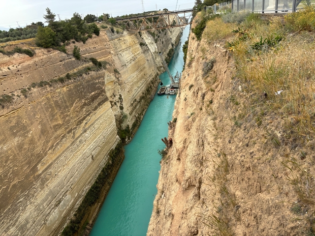       Steep canal with a narrow boat passage.
  