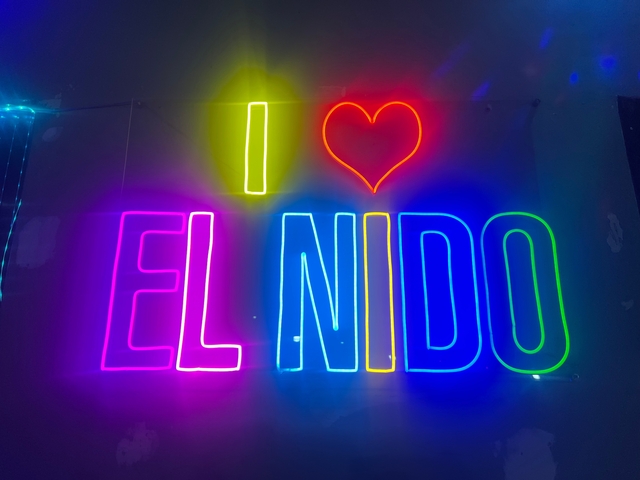       Neon sign saying 'I Love El Nido'.
  