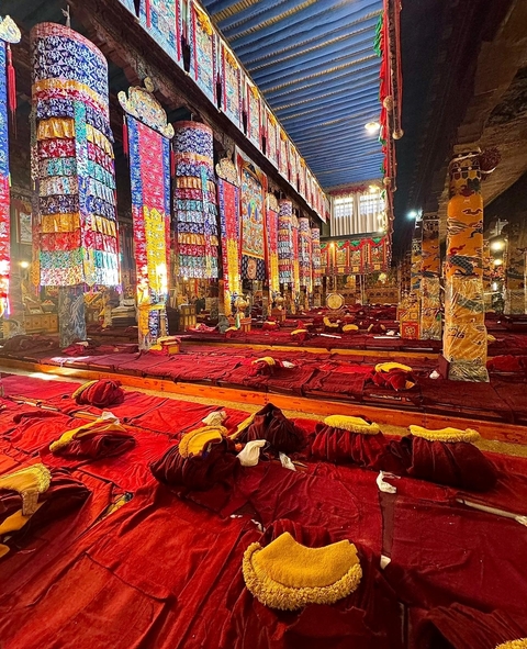 Ornate interior of a monastery with colorful decor.