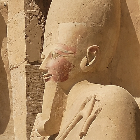 Close-up of an ancient Egyptian statue.