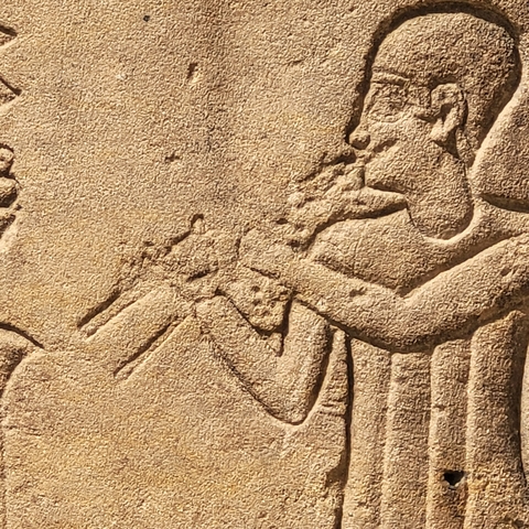 Stone carvings with ancient Egyptian motifs.