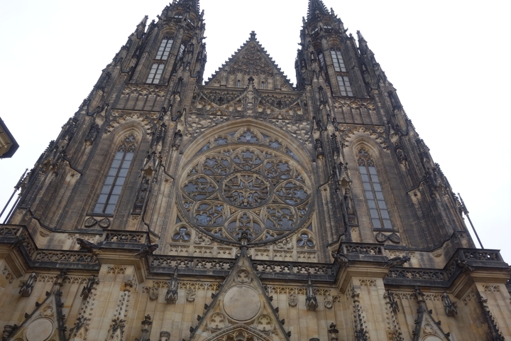 Facade of a grand gothic cathedral with intricate rose window.