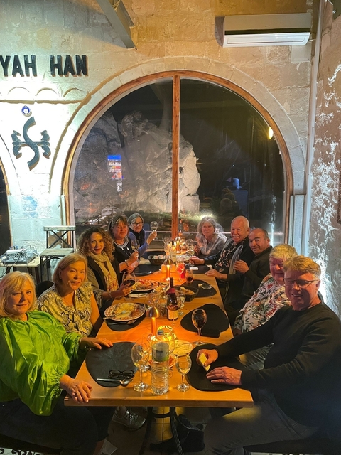 People dining inside a cave-style restaurant.