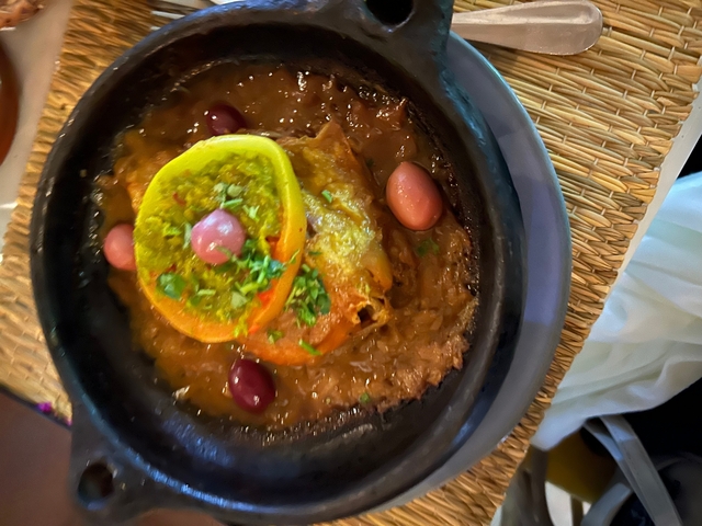 Traditional Moroccan dish served with vegetables.