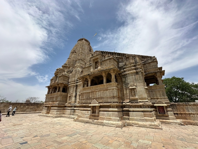       Ornate stone temple structure with carvings.
  