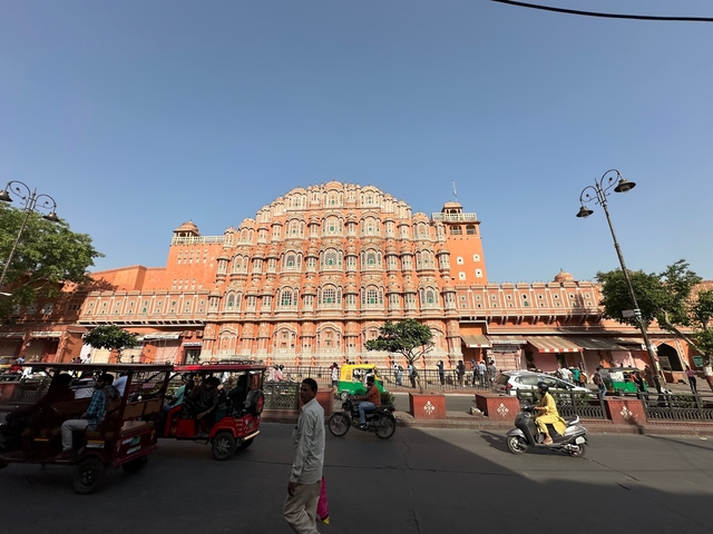       Hawa Mahal with street life in front.
  