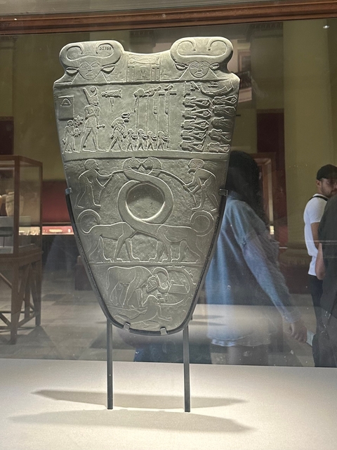       Ancient artifact displayed in a museum setting.
  