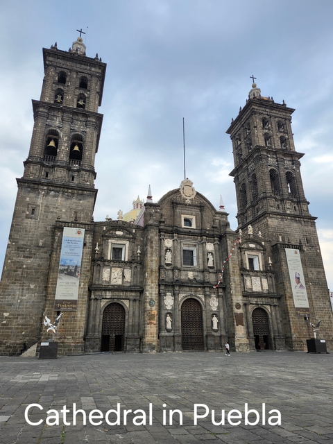 Historical church facade with twin bell towers.