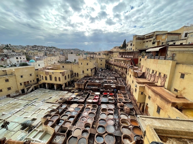 A traditional tannery in Fes, Morocco, with dyeing vats.