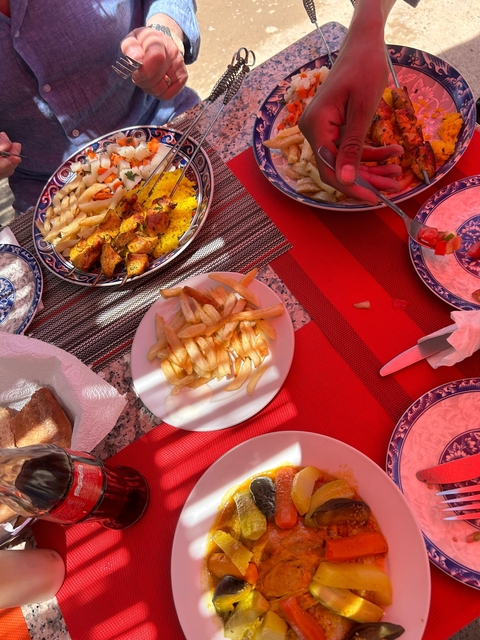 Traditional Moroccan meal with fries and spices.