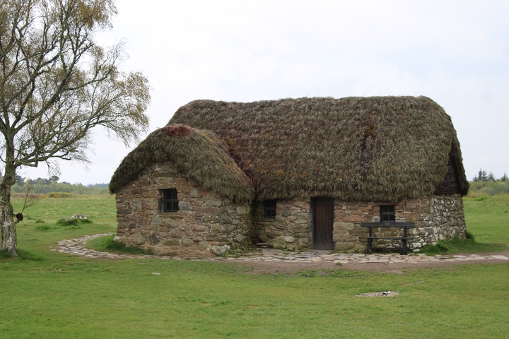 Traditional thatched roof cottage in Culloden.