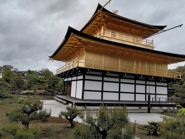 Golden Pavilion surrounded by a tranquil garden.