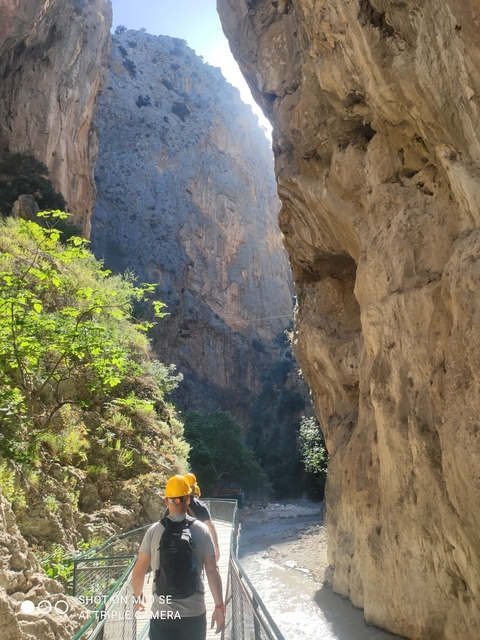       Rustic rocky landscape with a narrow gorge.
  