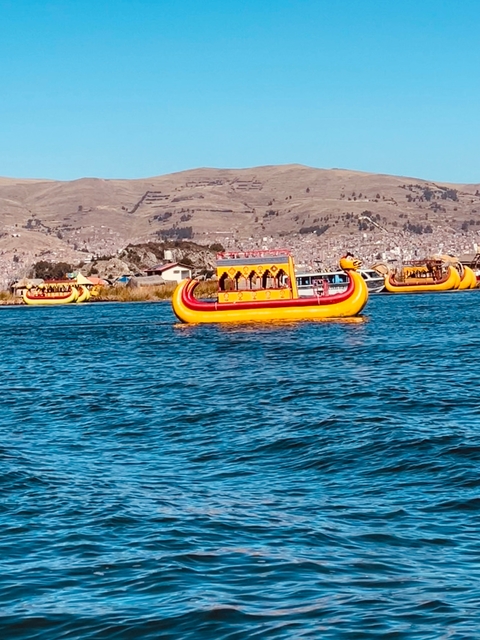       Colorful traditional boat on Lake Titicaca.
  