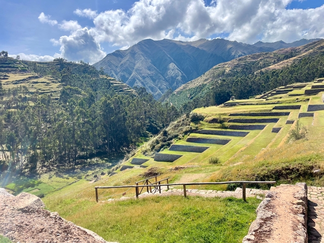 Terraced hills and mountains with pathways.