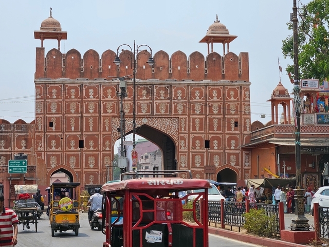Street view of a traditional gate in Jaipur.