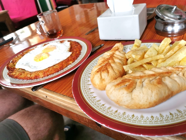       Traditional Nepalese meal on a wooden table
  