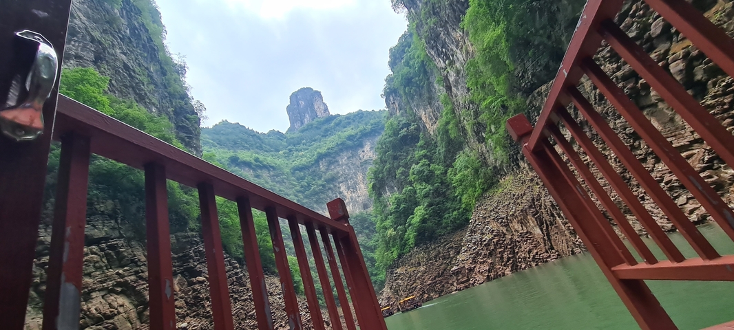 Scenic gorge view from a boat on a river.