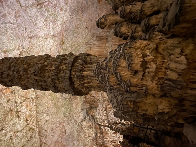 Giant stalactite formation inside a cave.