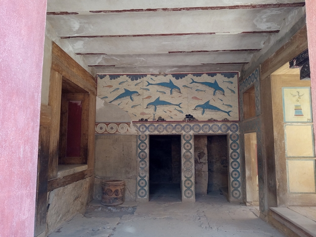       Interior of a historical site with dolphin fresco.
  