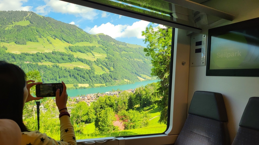 View from a train window of a beautiful valley.