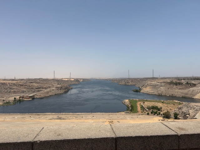       A river with rugged terrain and hilly landscape.
  