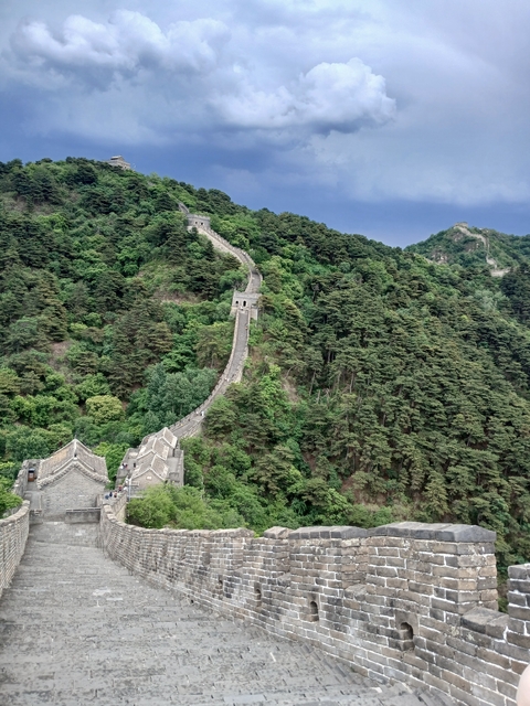 Great Wall of China stretching over mountains.