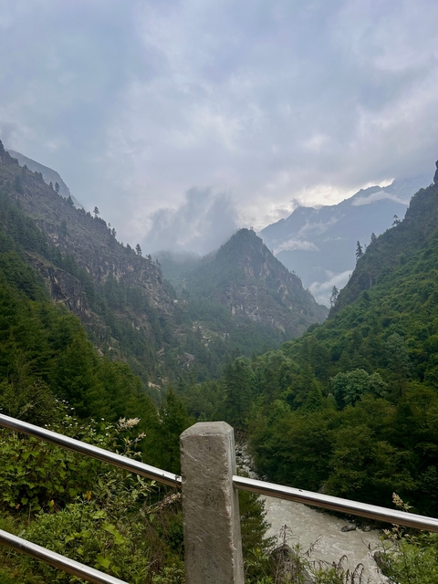 Verdant mountainous landscape shrouded in clouds