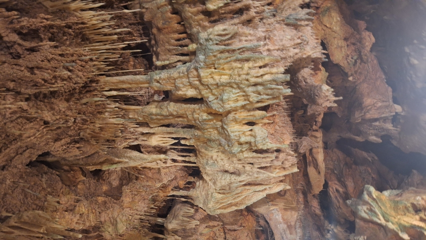       Stalactites in a cave.
  