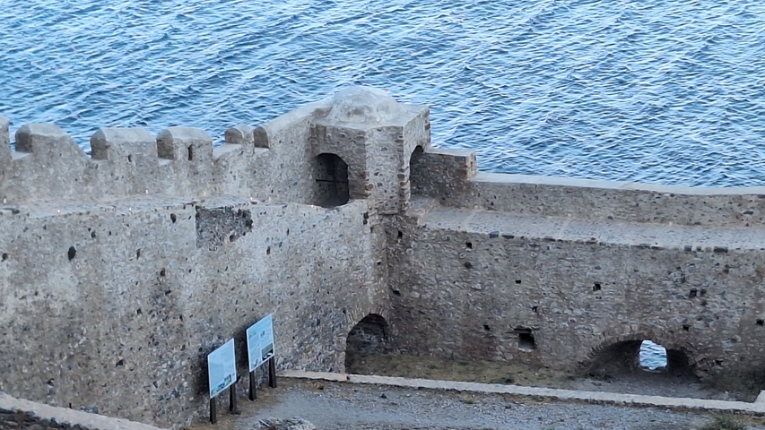       Stone fortress by the sea.
  