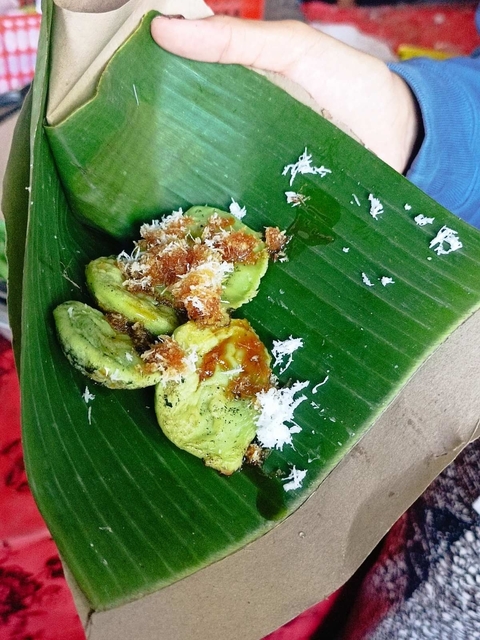 Traditional Indonesian dessert on a banana leaf.