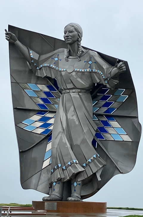 A statue with blue diamond embellishments.