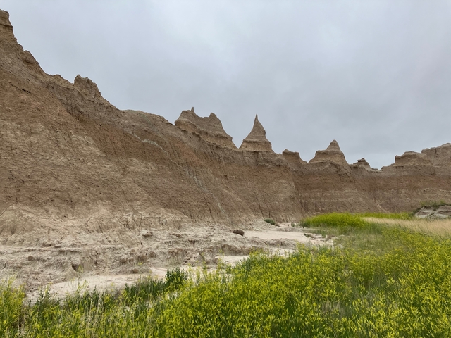 Eroded rock formations in a dry landscape.