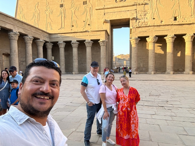 Group photograph in front of an ancient temple.