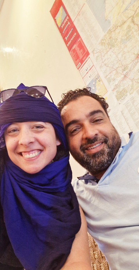       Close-up selfie of two people smiling.
  