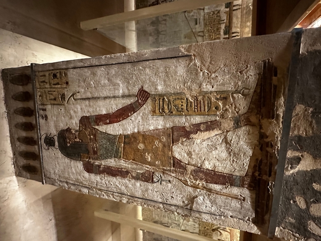 Ancient Egyptian wall painting with deities.